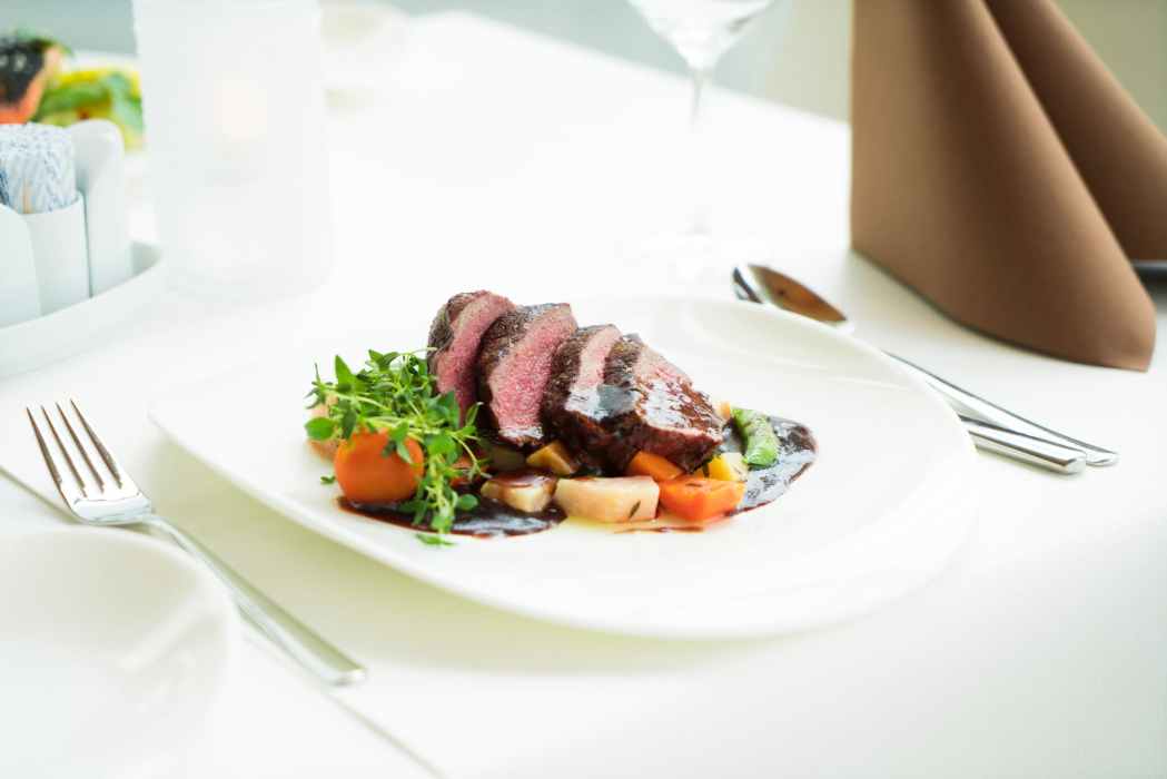 sliced steak on plate